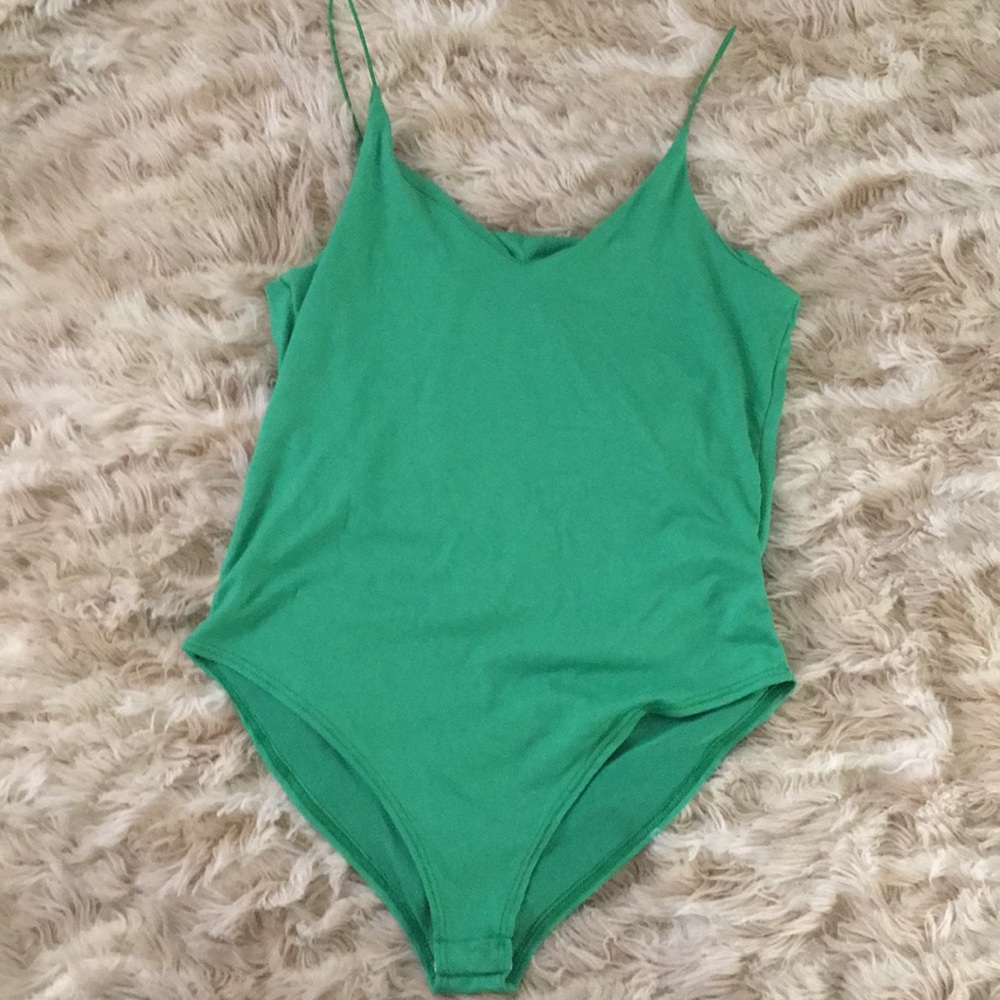 Green body suit.